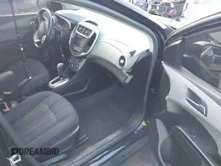 2020 Chevrolet Sonic LT z VIN 1G1JD5SB5L4106602, wystawiony jako IAAI lot #42159240 z przebiegiem 74 339 mil mil oraz . Historia ofert i sprzedaży dostępna na DreamBid. Obrazek 5.