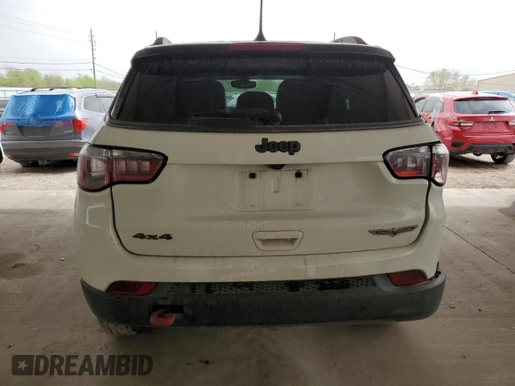 2019 Jeep Compass Trailhawk with VIN 3C4NJDDB9KT670934, listed as a Copart auction lot 48968305 with 101,129 mi miles and Clean Title. Bid and sale history available at carsss.com. Image 6.