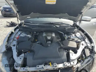 2014 Maserati Ghibli z VIN ZAM57XSA8E1087661, wystawiony jako Copart lot #54215595 z przebiegiem 108 280 mil mil oraz Szkoda całkowita • Salvage title. Historia ofert i sprzedaży dostępna na DreamBid. Obrazek 11.