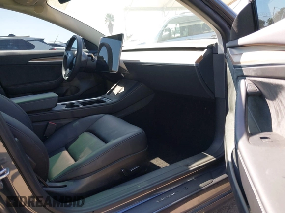 2023 Tesla Model 3 with VIN 5YJ3E1EA7PF673322, listed as a IAAI auction lot 42226767 with 18,367 mi miles and . Bid and sale history available at DreamBid. Image 5.