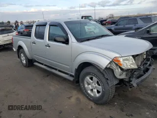 2010 Nissan Frontier SE with VIN 1N6AD0FVXAC420020, listed as a Copart auction lot 87324794 with 145,566 mi miles and Salvage title. Bid and sale history available at DreamBid. Image 4.