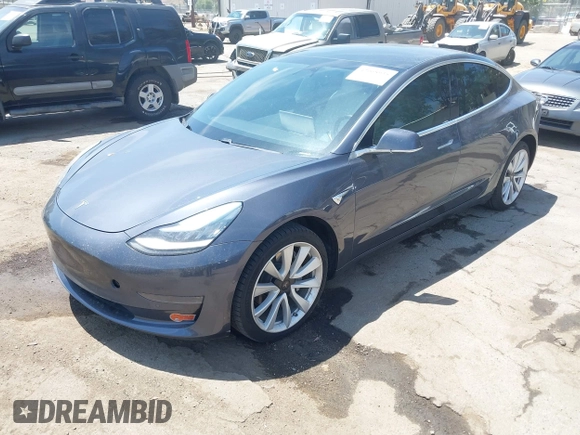 2020 Tesla Model 3 Standard Range Plus with VIN 5YJ3E1EAXLF615781, listed as a IAAI auction lot 42068935 with 96,026 mi miles. Bid and sale history available at carsss.com. Image 20.