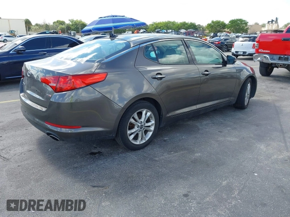 2011 Kia Optima EX with VIN KNAGN4A74B5164311, listed as a IAAI auction lot 41558907 with Not Provided miles and . Bid and sale history available at carsss.com. Image 4.