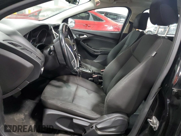 2015 Ford Focus SE with VIN 1FADP3F26FL220649, listed as a Copart auction lot 56551045 with 207,819 mi miles and Clean Title. Bid and sale history available at DreamBid. Image 7.
