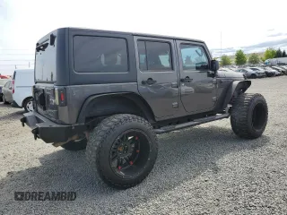 2016 Jeep Wrangler Unlimited Freedom with VIN 1C4BJWDG8GL300314, listed as a Copart auction lot 61044645 with 103,396 mi miles and Clean title. Bid and sale history available at DreamBid. Image 3.