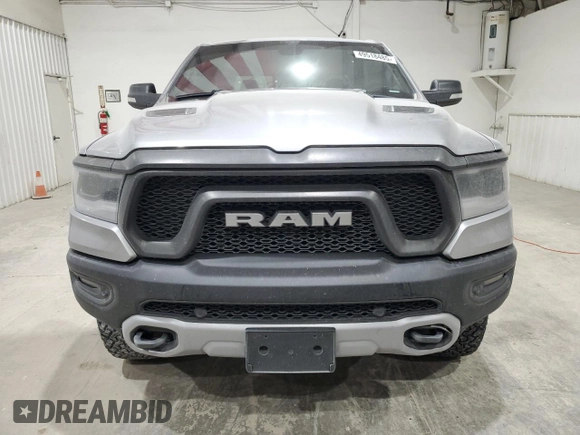 2019 Ram 1500 Rebel z VIN 1C6SRFLT3KN671103, wystawiony jako Copart lot #49518485 z przebiegiem 134 232 mil mil oraz Czysty tytuł • Clean title. Historia ofert i sprzedaży dostępna na DreamBid. Obrazek 5.