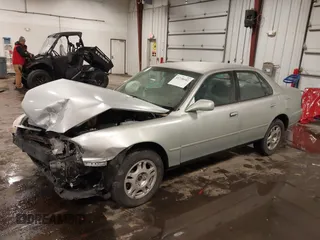 1995 Toyota Camry LE with VIN 4T1GK12E5SU080734, listed as a IAAI auction lot 41738102 with 211,559 mi miles. Bid and sale history available at carsss.com. Image 18.