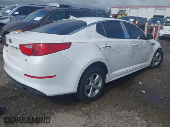 2015 Kia Optima LX z VIN 5XXGM4A73FG438282, wystawiony jako IAAI lot #42389042 z przebiegiem 228 753 mil mil oraz . Historia ofert i sprzedaży dostępna na DreamBid. Obrazek 4.