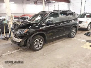 2023 Honda Passport TrailSport with VIN 5FNYF8H64PB016819, listed as a IAAI auction lot 41997402 with 22,106 mi miles and . Bid and sale history available at DreamBid. Image 2.