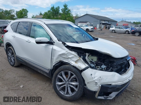 2020 Honda CR-V Touring z VIN 2HKRW2H97LH676151, wystawiony jako IAAI lot #42340956 z przebiegiem 32 492 mil mil oraz . Historia ofert i sprzedaży dostępna na DreamBid. Obrazek 6.