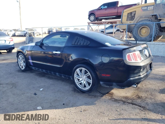 2011 Ford Mustang V6 with VIN 1ZVBP8AM8B5163034, listed as a Copart auction lot 83619534 with 112,949 mi miles and Salvage title. Bid and sale history available at DreamBid. Image 2.