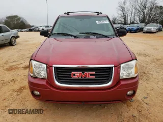 2004 GMC Envoy SLT with VIN 1GKDT13S342262833, listed as a Copart auction lot 87828975 with 203,404 mi miles and Salvage Title. Bid and sale history available at carsss.com. Image 5.