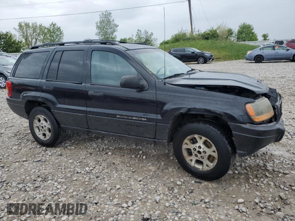 2000 Jeep Grand Cherokee Laredo z VIN 1J4GW48S1YC326453, wystawiony jako Copart lot #57332675 z przebiegiem 290 059 mil mil oraz Czysty tytuł • Clean title. Historia ofert i sprzedaży dostępna na DreamBid. Obrazek 4.
