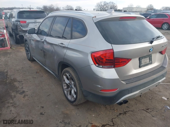 2014 BMW X1 sDrive28i with VIN WBAVM1C52EVW48857, listed as a IAAI auction lot 41179830 with 113,315 mi miles. Bid and sale history available at carsss.com. Image 3.