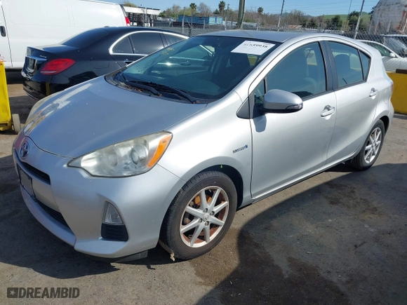 2013 Toyota Prius c One with VIN JTDKDTB3XD1534662, listed as a IAAI auction lot 41859938 with 136,151 mi miles. Bid and sale history available at carsss.com. Image 17.