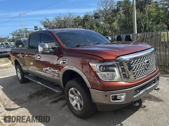 2016 Nissan Titan SL z VIN 1N6BA1F20GN510413, wystawiony jako Copart lot #48017425 z przebiegiem 225 717 mil mil oraz Czysty tytuł • Clean title. Historia ofert i sprzedaży dostępna na DreamBid. Obrazek 1.
