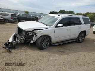 2015 Chevrolet Tahoe LTZ with VIN 1GNSKCKC1FR310018, listed as a Copart auction lot 71798454 with 244,179 mi miles and Salvage title. Bid and sale history available at DreamBid. Image 1.
