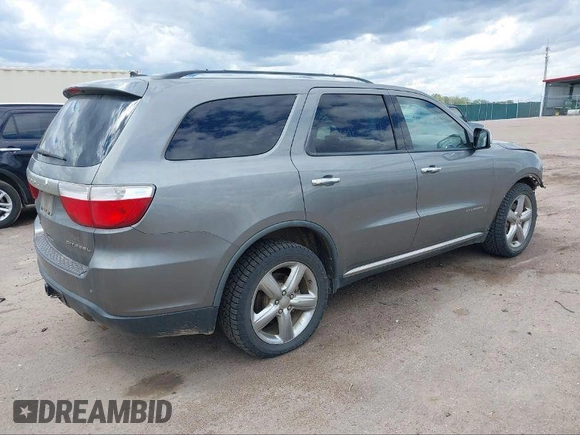 2011 Dodge Durango Citadel with VIN 1D4RE5GG5BC664579, listed as a IAAI auction lot 40812809 with 209,743 mi miles. Bid and sale history available at carsss.com. Image 4.