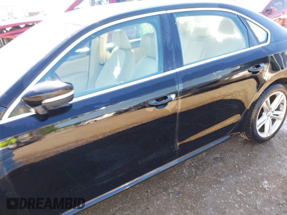 2014 Volkswagen Passat SE с VIN 1VWBN7A37EC002696, выставлен на аукционе IAAI как лот 42308028 с пробегом 165 111 миль миль и . История ставок и продаж доступна на DreamBid. Изображение 14.