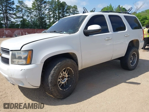 2012 Chevrolet Tahoe LS z VIN 1GNSCAE02CR230483, wystawiony jako IAAI lot #42071934 z przebiegiem 169 050 mil mil oraz . Historia ofert i sprzedaży dostępna na DreamBid. Obrazek 2.
