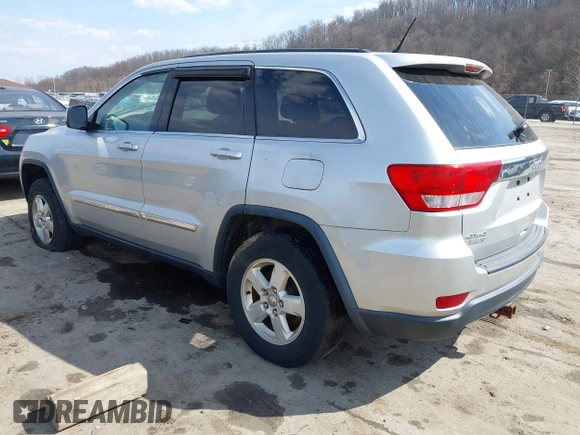 2013 Jeep Grand Cherokee Laredo with VIN 1C4RJFAG5DC634685, listed as a IAAI auction lot 41792147 with 260,594 mi miles. Bid and sale history available at carsss.com. Image 3.