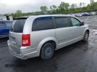 2010 Chrysler Town & Country Touring with VIN 2A4RR5D18AR151604, listed as a IAAI auction lot 42208309 with 207,886 mi miles and . Bid and sale history available at DreamBid. Image 4.