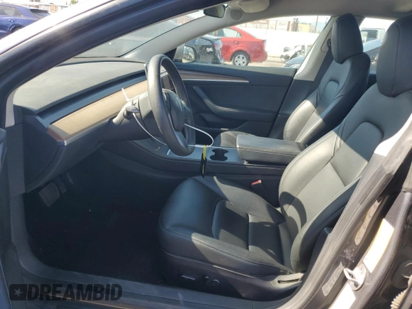 2023 Tesla Model 3 с VIN 5YJ3E1EAXPF607931, выставлен на аукционе Copart как лот 52629305 с пробегом 87 785 миль миль и Списание • Salvage title. История ставок и продаж доступна на DreamBid. Изображение 7.