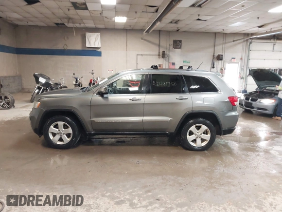 2011 Jeep Grand Cherokee Laredo with VIN 1J4RR4GG7BC578079, listed as a IAAI auction lot 42491750 with 197,581 mi miles and . Bid and sale history available at DreamBid. Image 15.