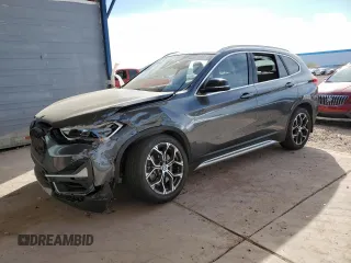 2020 BMW X1 xDrive28i with VIN WBXJG9C07L5P15870, listed as a Copart auction lot 44561265 with 58,819 mi miles and Salvage Title. Bid and sale history available at carsss.com. Image 1.