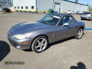2003 Mazda MX-5 Miata Cloth with VIN JM1NB353430308653, listed as a Copart auction lot 53129865 with 144,549 mi miles and Salvage Title. Bid and sale history available at DreamBid. Image 1.