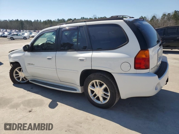 2006 GMC Envoy Denali with VIN 1GKET63M762190296, listed as a Copart auction lot 46691595 with 128,985 mi miles and Salvage Title. Bid and sale history available at carsss.com. Image 2.