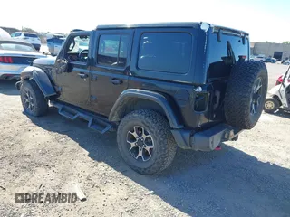 2018 Jeep Wrangler Unlimited Rubicon with VIN 1C4HJXFGXJW255881, listed as a IAAI auction lot 42316499 with 39,439 mi miles and . Bid and sale history available at DreamBid. Image 3.