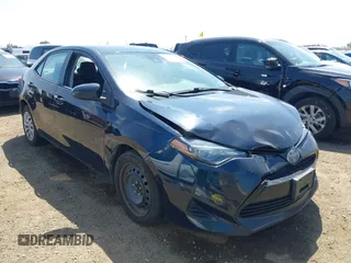 2019 Toyota Corolla L with VIN 2T1BURHE6KC185004, listed as a IAAI auction lot 42105629 with 111,907 mi miles. Bid and sale history available at carsss.com. Image 6.