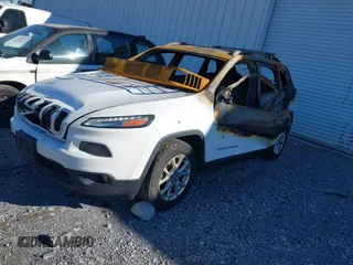 2014 Jeep Cherokee Altitude with VIN 1C4PJMCB5EW120946, listed as a IAAI auction lot 41348100 with Not Provided miles and . Bid and sale history available at DreamBid. Image 16.