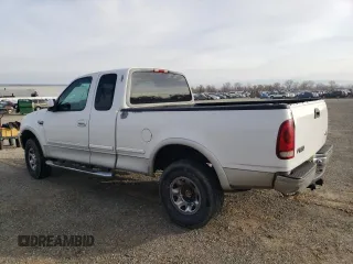 1998 Ford F-250 with VIN 1FTPX28L4WKA41149, listed as a Copart auction lot 84369654 with 430,187 mi miles and Salvage title. Bid and sale history available at DreamBid. Image 2.