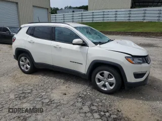2020 Jeep Compass Latitude with VIN 3C4NJCBB3LT235180, listed as a Copart auction lot 57204295 with 74,821 mi miles and Salvage title. Bid and sale history available at DreamBid. Image 4.