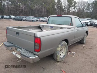 2000 Nissan Frontier XE z VIN 1N6DD21S9YC310558, wystawiony jako IAAI lot #41388581 z przebiegiem Nie podano mil oraz . Historia ofert i sprzedaży dostępna na DreamBid. Obrazek 4.