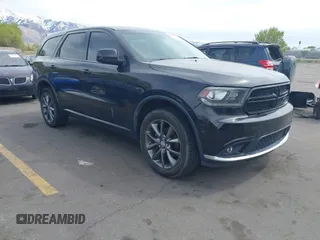 2015 Dodge Durango SXT with VIN 1C4RDJAGXFC796034, listed as a IAAI auction lot 42057983 with 159,108 mi miles and . Bid and sale history available at DreamBid. Image 1.