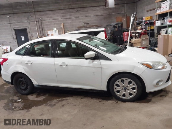 2012 Ford Focus SE с VIN 1FAHP3F21CL301085, выставлен на аукционе IAAI как лот 42321328 с пробегом 157 818 миль миль и . История ставок и продаж доступна на DreamBid. Изображение 13.