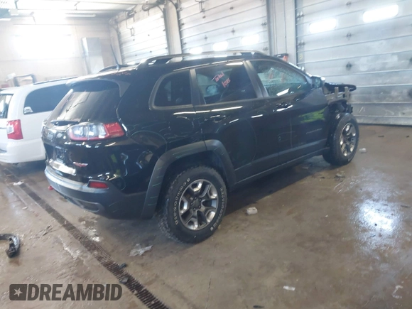2019 Jeep Cherokee Trailhawk Elite with VIN 1C4PJMBX5KD278921, listed as a IAAI auction lot 41843126 with 139,431 mi miles. Bid and sale history available at carsss.com. Image 4.
