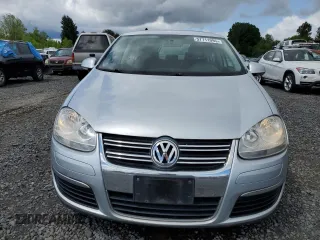 2009 Volkswagen Jetta SE with VIN 3VWRM71K99M156016, listed as a Copart auction lot 57711095 with 206,869 mi miles and Clean title. Bid and sale history available at DreamBid. Image 5.
