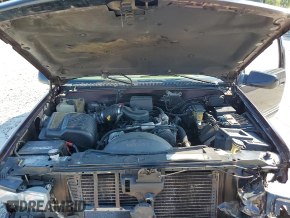 1997 GMC Yukon with VIN 1GKEK13R7VJ711782, listed as a Copart auction lot 74793184 with 208,718 mi miles and Salvage Title. Bid and sale history available at carsss.com. Image 13.