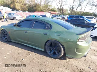 2019 Dodge Charger Scat Pack with VIN 2C3CDXGJ4KH572619, listed as a IAAI auction lot 40973015 with 40,148 mi miles and . Bid and sale history available at DreamBid. Image 3.