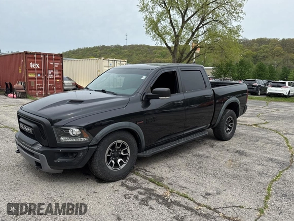 2016 Ram 1500 Rebel z VIN 1C6RR7YT2GS171455, wystawiony jako Copart lot #54708635 z przebiegiem 150 421 mil mil oraz Tytuł czysty. Historia ofert i sprzedaży dostępna na DreamBid. Obrazek 2.