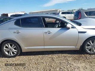 2011 Kia Optima EX with VIN KNAGN4A62B5147448, listed as a IAAI auction lot 41823132 with 219,412 mi miles and . Bid and sale history available at carsss.com. Image 12.