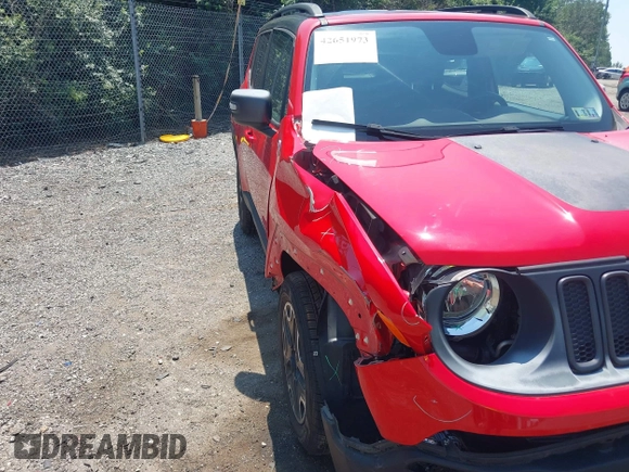 2016 Jeep Renegade Trailhawk with VIN ZACCJBCT0GPD21696, listed as a IAAI auction lot 42651973 with 91,106 mi miles and . Bid and sale history available at DreamBid. Image 6.