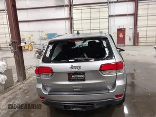 2020 Jeep Grand Cherokee Altitude z VIN 1C4RJFAG1LC185097, wystawiony jako IAAI lot #42096690 z przebiegiem Nie podano mil oraz . Historia ofert i sprzedaży dostępna na DreamBid. Obrazek 15.