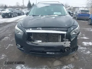 2015 Infiniti QX60 z VIN 5N1AL0MM7FC524175, wystawiony jako IAAI lot #41417720 z przebiegiem 124 622 mil mil oraz . Historia ofert i sprzedaży dostępna na DreamBid. Obrazek 6.