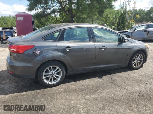 2017 Ford Focus SE with VIN 1FADP3F21HL251357, listed as a Copart auction lot 65214535 with 76,895 mi miles and Clean title. Bid and sale history available at DreamBid. Image 3.