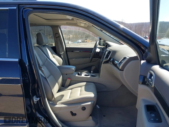 2011 Jeep Grand Cherokee Laredo with VIN 1J4RR4GG3BC670712, listed as a IAAI auction lot 41738127 with 93,714 mi miles and . Bid and sale history available at DreamBid. Image 5.
